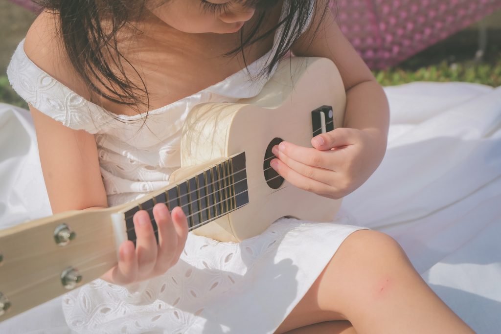 Getting your children to play instruments as praise is a great way to talk about Jesus